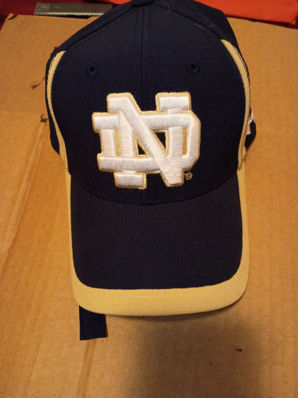 Notre Dame  Under Armour Navy and Gold Baseball Cap with Embroidered ND Emblem